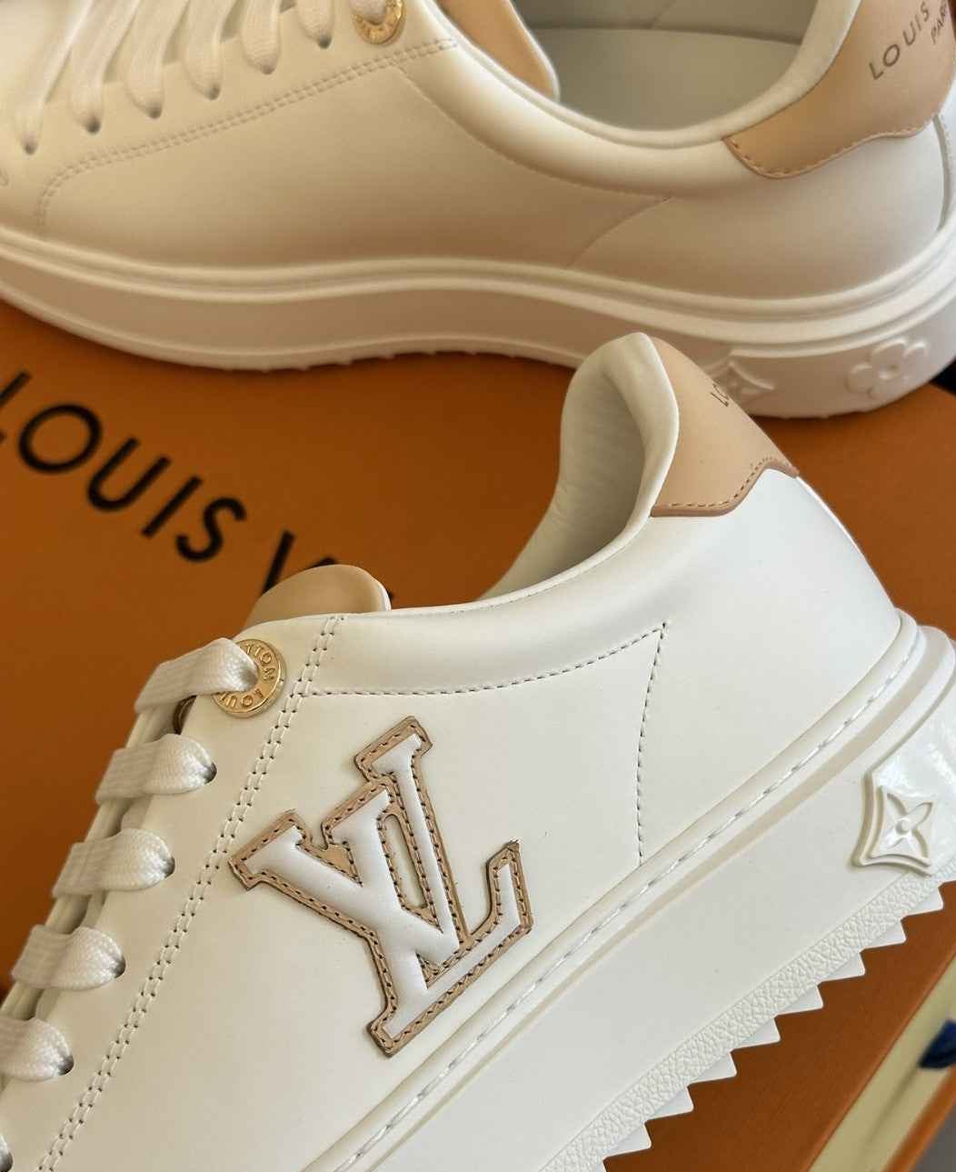 Women's Louis Vuitton Time Out Sneakers - itzy bitsy
